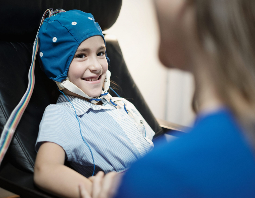 portrait-of-smiling-autistic-girl-undergoing-an-ee-2021-08-29-07-16-37-utc(1)