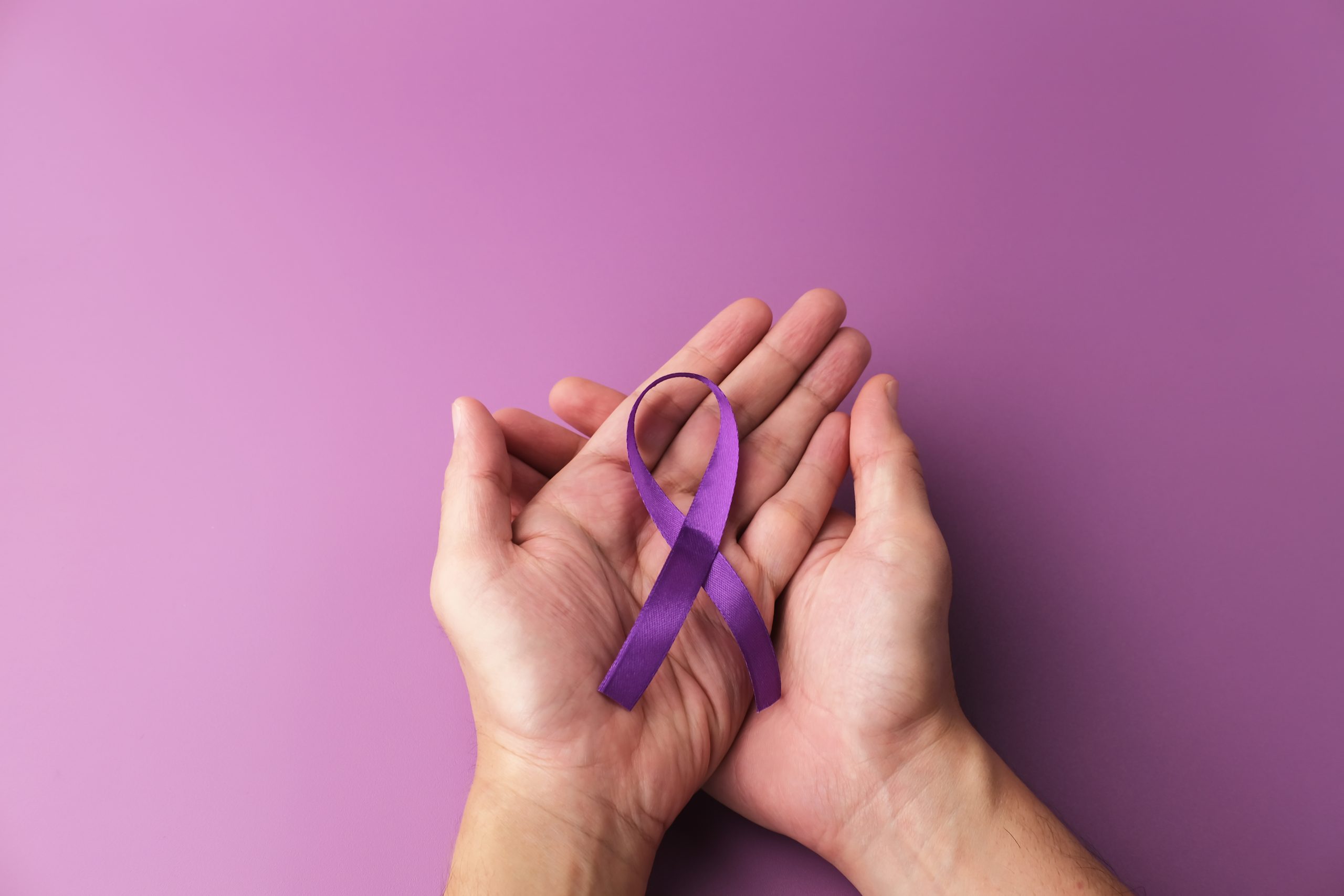 purple-ribbon-as-symbol-of-world-cancer-day-2022-10-19-05-06-44-utc
